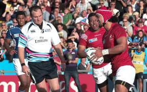 Tonga's Latiume Fosita scores against Namibia at the Rugby World Cup.