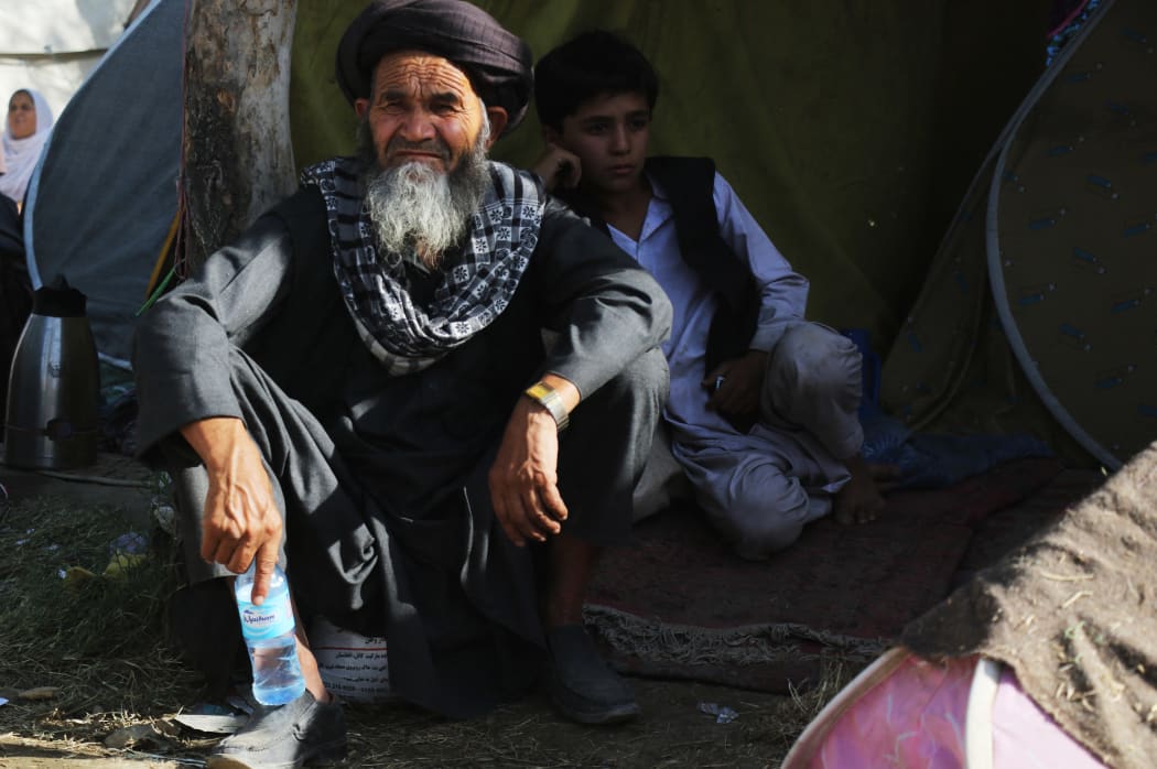 Thousands of displaced families suffer hardships in a park in Kabul, Afghanistan, on August 11, 2021.