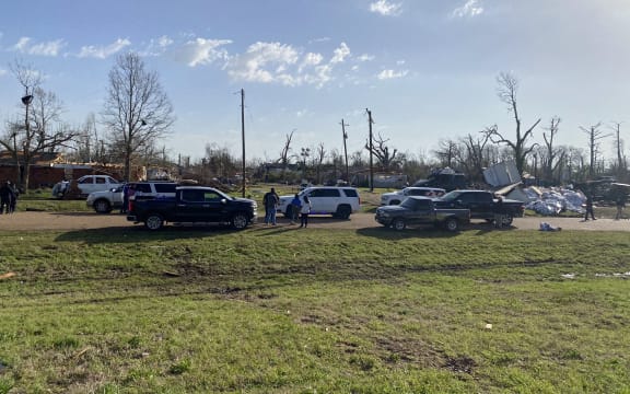 Emergency personnel and clean up crews in Silver City, Mississippi.