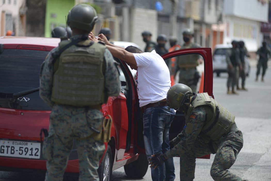 Ecuador's President Guillermo Lasso on October 19 declared a state of emergency in the country grappling with a surge in drug-related violence, and ordered the mobilization of police and military in the streets.