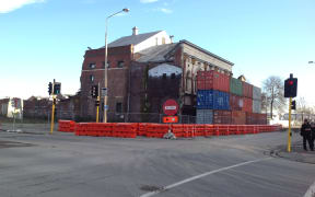 Containers prop up a building in central Christchurch.