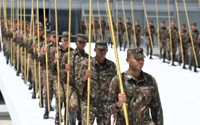 Soldiers of the Brazilian Army prepare for the inauguration ceremony of Brazilian President-elect Luiz Inacio Lula da Silva at the Planalto Palace in Brasilia, on December 27, 2022.