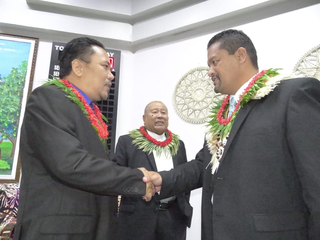 New Speaker Kenneth Kedi (left) congratulates new President Casten Nemra (right)
