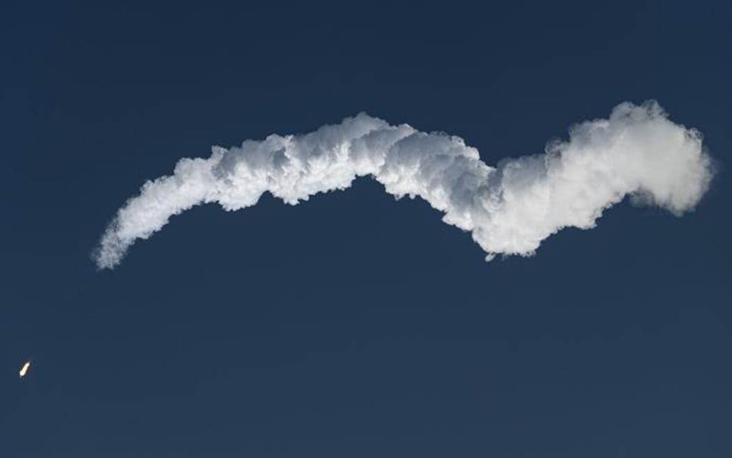 A Space X Falcon 9 rocket heads for orbit, leaving a trail of exhaust vapours behind it. The effect of these gases in our atmosphere is now a subject for environmental investigation.