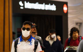 Passengers arrrive at Auckland Airport Monday 16 March