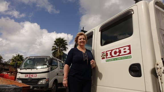 Annette de Wet from ICB retaining standing next to a truck