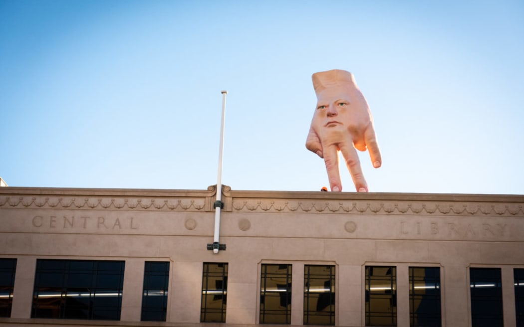 Ronnie Van Hout's Quasi atop City Gallery Wellington