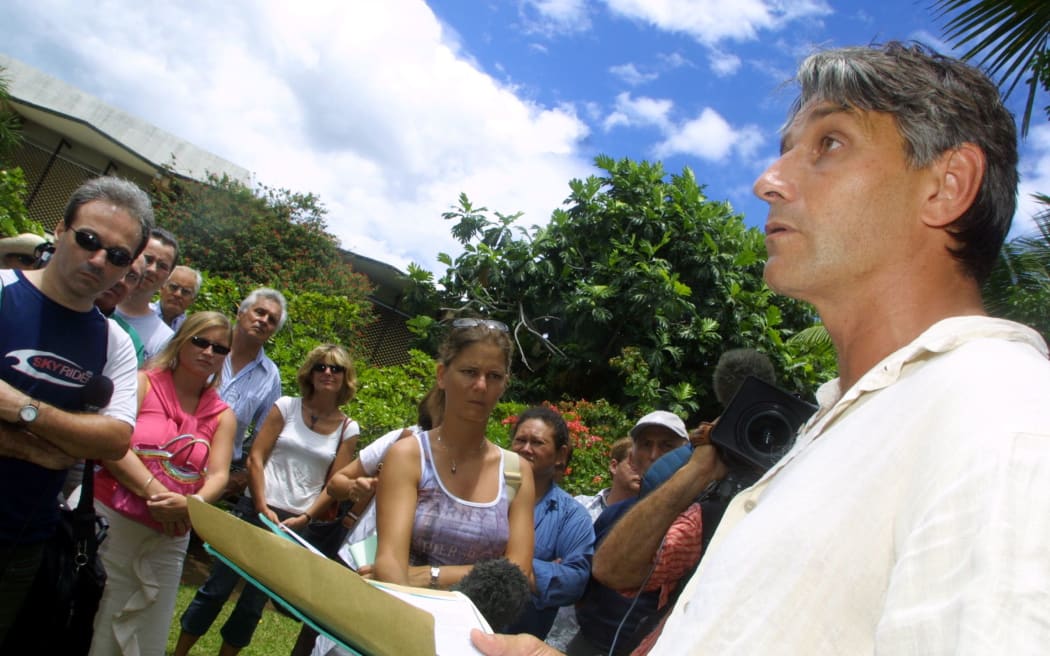 Philippe Couraud believes his brother was the victim of a political assassination. Here, he is pictured in 2004 outside a court in Papeete, after demanding an investigation.