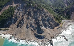 The scale of the slip, with enough material to "fill 300 Olympic-sized swimming pools" can be seen from the air.