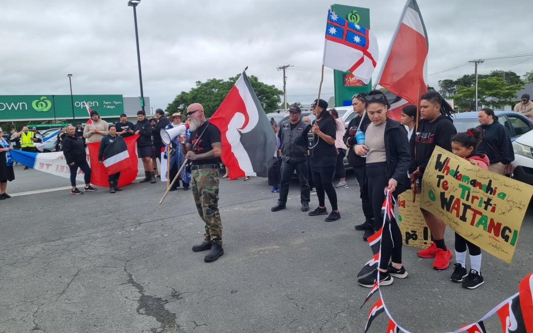 Close to 200 people have gathered in Dargaville on 14 December to protest against the Kaipara mayor.