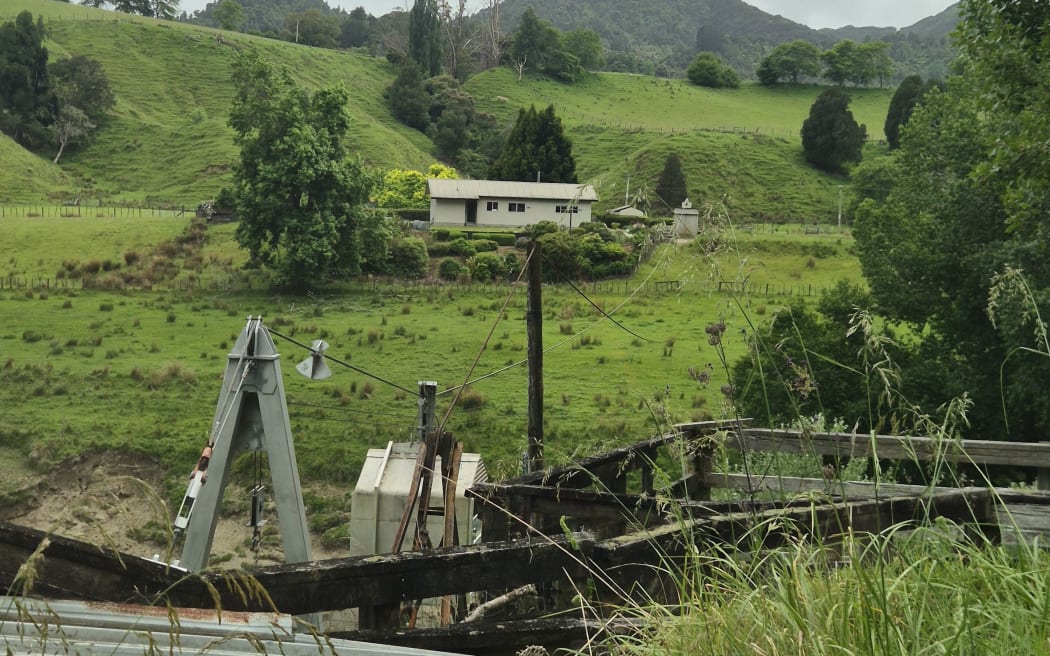 A home on the other side of the river which residents access via flying fox.