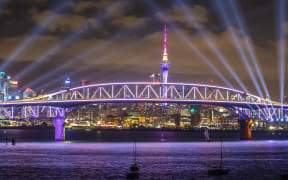 A light display replaced the traditional fireworks display from the Sky Tower in Auckland.