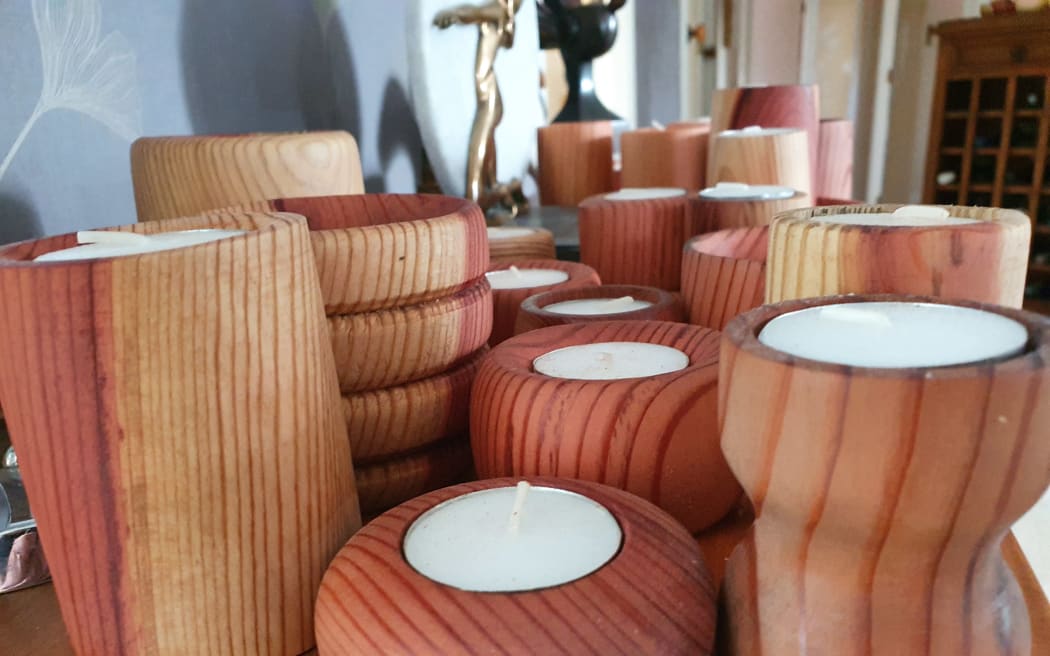 Remembrance tealights made from the redwood off-cuts by another Rissington local Bryan Nichols. Koha for them will help pay for the sculpture's upkeep, he says.