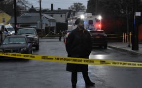 A police officer at the scene of the stabbing. (Photo by Kyle Mazza/NurPhoto) (Photo by Kyle Mazza / NurPhoto / NurPhoto via AFP)
