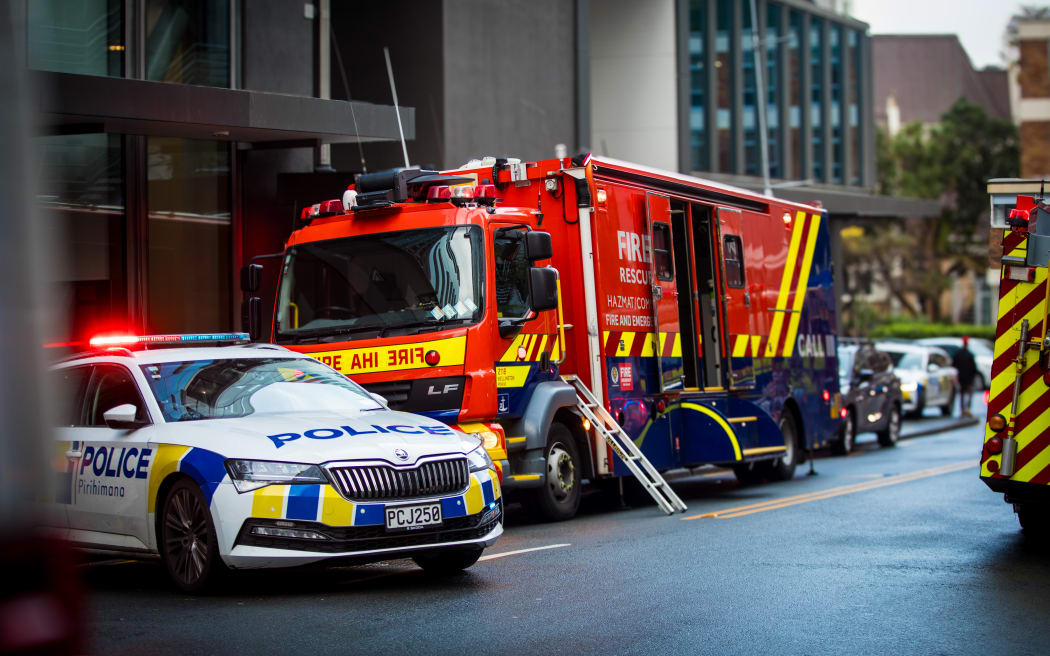 Emergency services at the scene of a fire at Kāinga Ora apartments.