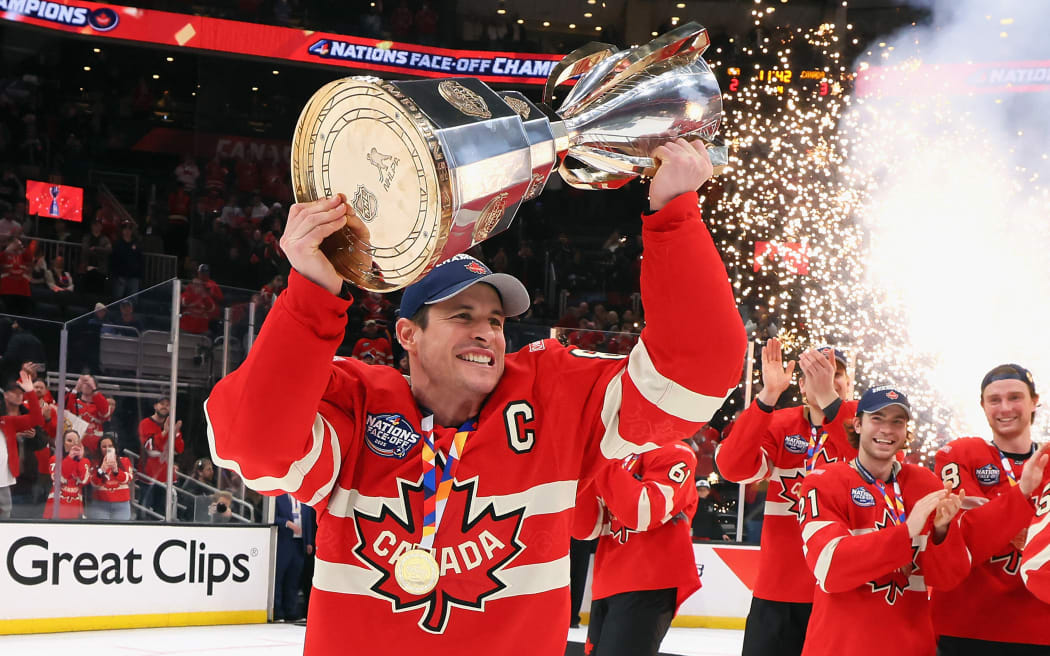 Sidney Crosby of Team Canada celebrates with his teammates after defeating Team United States in overtime to win the NHL 4 Nations Face-Off, 2025.