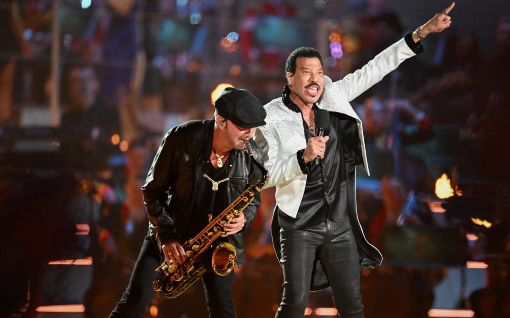 US pop star Lionel Richie performs inside Windsor Castle grounds at the Coronation Concert, in Windsor, west of London on May 7, 2023. - For the first time ever, the East Terrace of Windsor Castle will host a spectacular live concert that will also be seen in over 100 countries around the world. The event will be attended by 20,000 members of the public from across the UK.