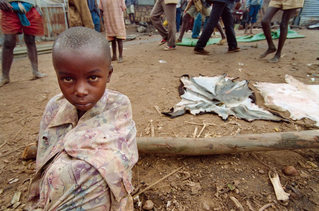 A young girl fleeing the war-ravaged Rwandan capital Kigali in1994.