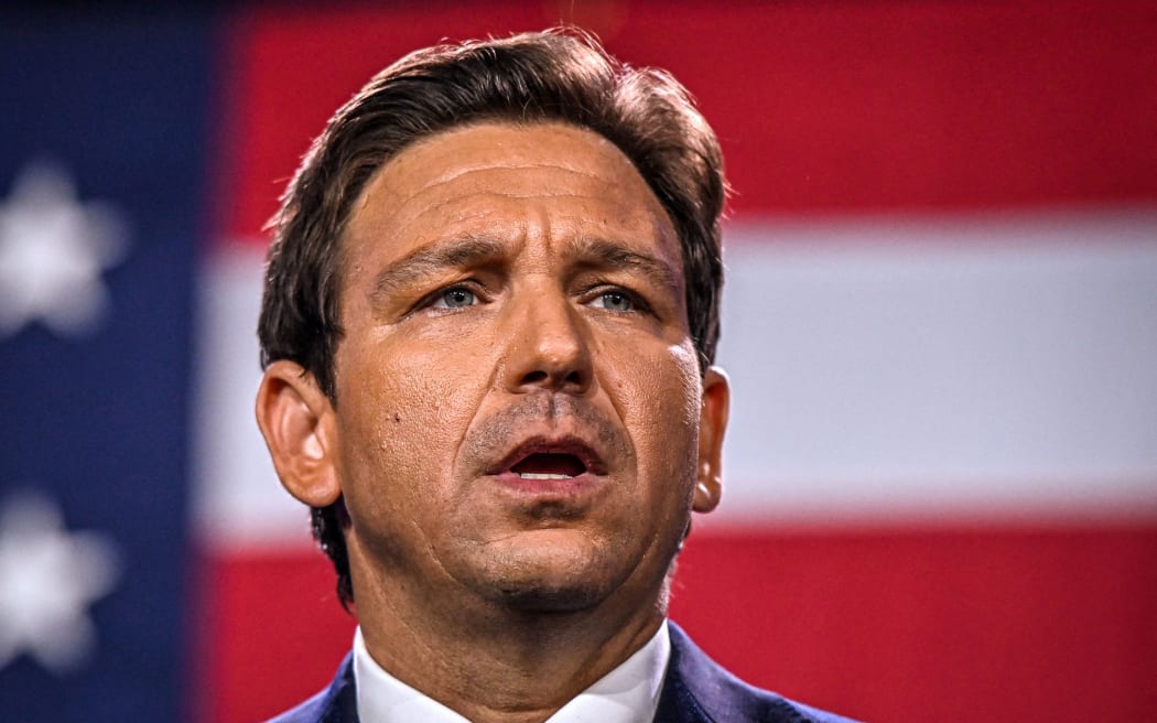 (FILES) Republican gubernatorial candidate for Florida Ron DeSantis speaks during an election night watch party at the Convention Center in Tampa, Florida, on November 8, 2022. Florida Governor and 2024 Republican presidential hopeful Ron DeSantis has dropped out of the US presidential campaign and endorsed former US president Donald Trump, DeSantis announced in a video posted to his X (formerly Twitter) account on January 21, 2024. (Photo by Giorgio VIERA / AFP)