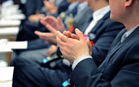 Men clapping