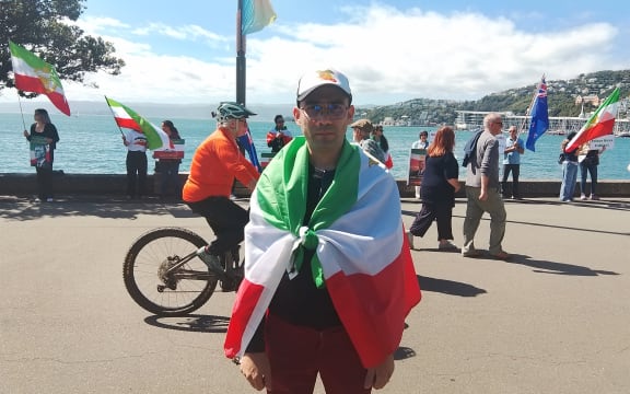 Ali Jafari-Gh, an Iranian-born academic who teaches at Massey University, at a protest by Iranians and their supporters in Wellington, to show support for those in Iran living under repression. Near Frank Kitts Park, on Saturday 7 March, 2026.