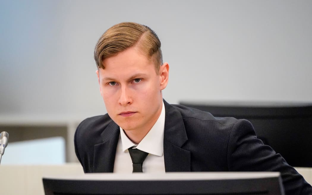 Norwegian Philip Manshaus arrives into the courtroom for the start of his trial at Asker and Baerum district court, outside Oslo, on May 7, 2020