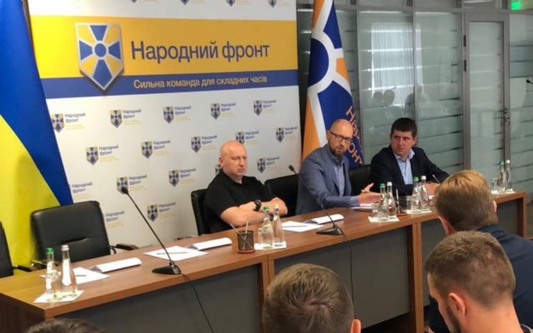 Arseniy Yatsenyuk (centre) of Ukraine's People's Front Party