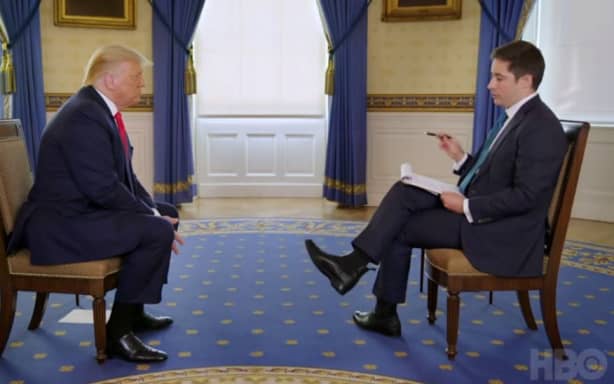 Axios National Political Correspondent Jonathan Swan speaking with US President Donald Trump.