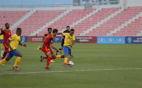Raphael Lea'i bares down on the Papua New Guinea goal.