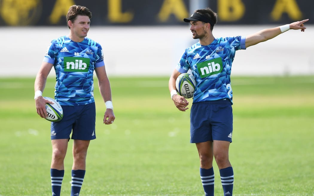 Beauden Barrett and Otere Black talk tactics at Blues training.