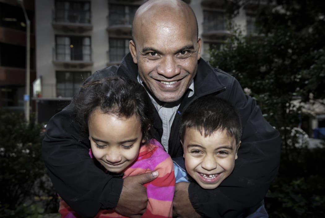 13072016 Photo: Rebekah Parsons-King. Former Nauru opposition MP Roland Kun has left Nauru and arrived in New Zealand after being issued with a New Zealand passport. Pictured with Hana Kun (8 years old) L and Yoshi Kun (6 years old) R.