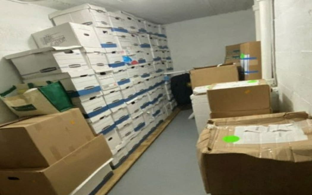 This undated image, released by the US District Court Southern District of Florida, attached as evidence in the indictment against former US president Donald Trump shows stacks of boxes in a storage room allegedly at Mar-a-Lago, the former presidents private club. Federal prosecutors unsealed a wide-ranging indictment of Donald Trump on Friday, accusing the former US president of endangering national security by holding on to top secret nuclear and defense documents after leaving the White House. (Photo by Handout / US DEPARTMENT OF JUSTICE / AFP) / RESTRICTED TO EDITORIAL USE - MANDATORY CREDIT "AFP PHOTO / US DISTRICT COURT SOUTHERN DISTRICT OF FLORIDA" - NO MARKETING NO ADVERTISING CAMPAIGNS - DISTRIBUTED AS A SERVICE TO CLIENTS