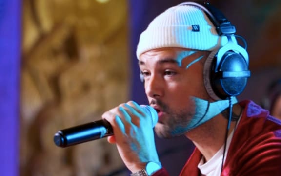 Rapper REI performing live