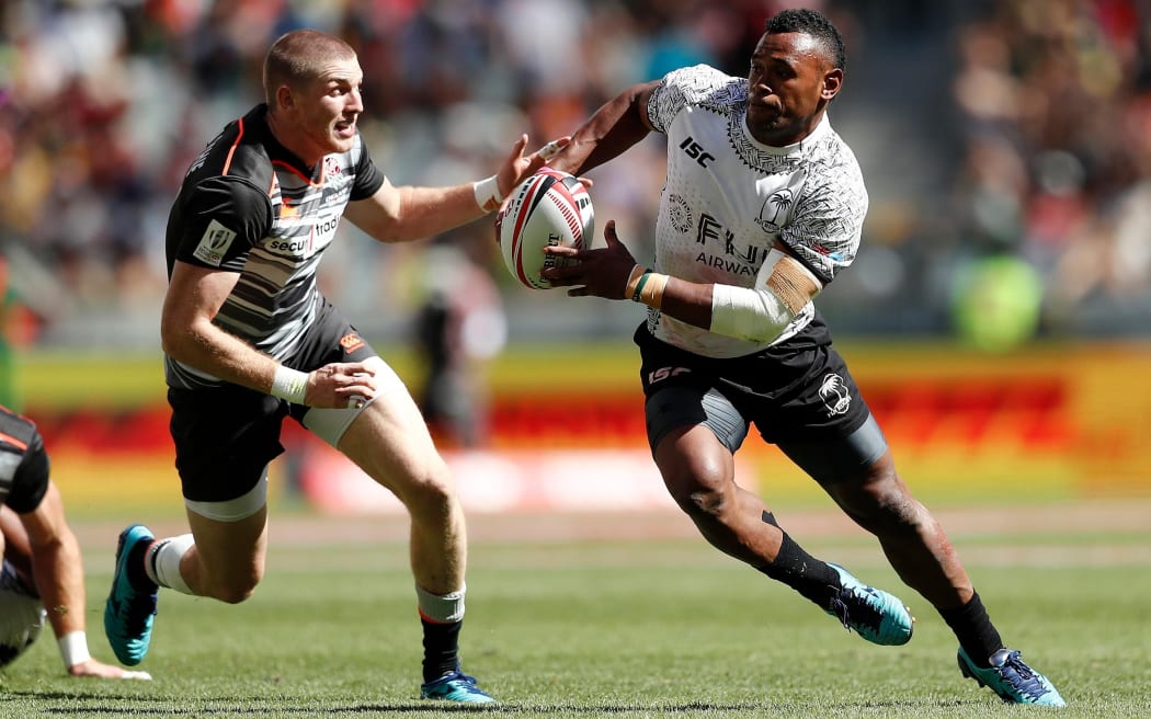 Fiji's Amenoni Nasilasila attacks against England during the Cape Town Sevens.
