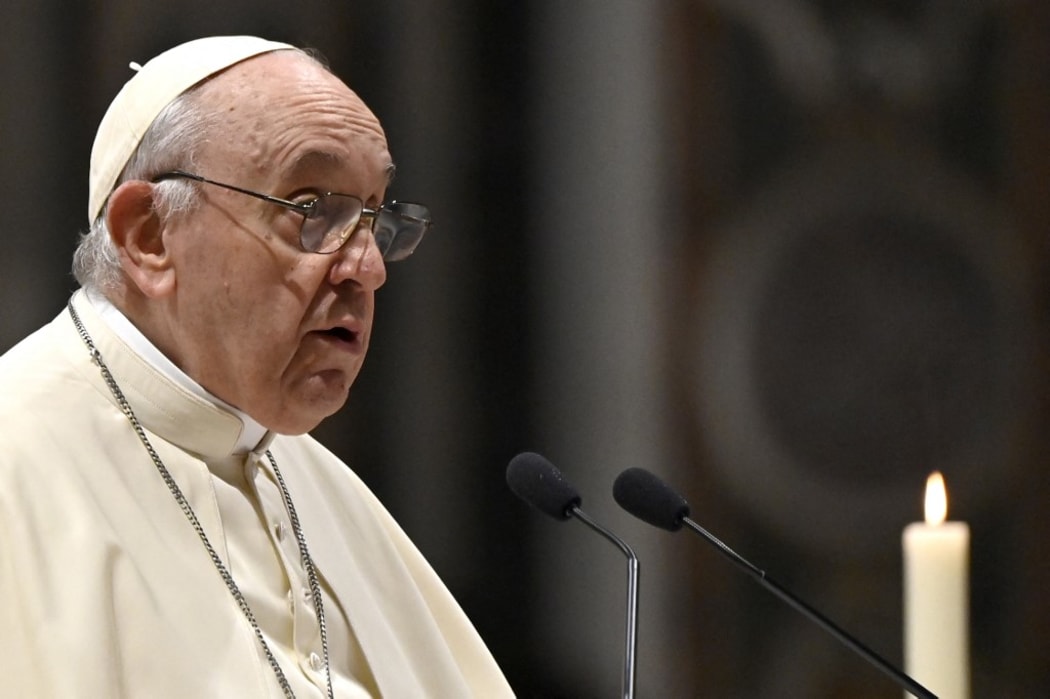 Pope Francis celebrates a mass during the first Vespers and Te Deum prayer in Saint Peter's Basilica at the Vatican on December 31, 2021. (Photo by Alberto PIZZOLI / AFP)