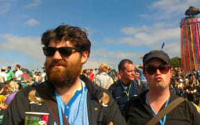Phoenix Foundation bandmates Samuel Flynn Scott and Conrad Wedde on the battlefield of Glastonbury.