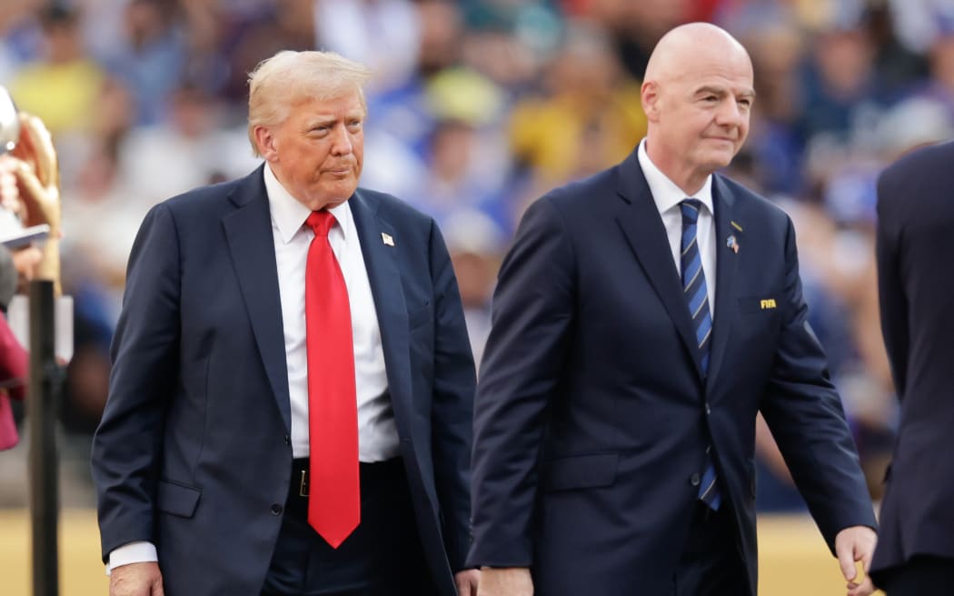 Donald Trump (L) and Gianni Infantino.