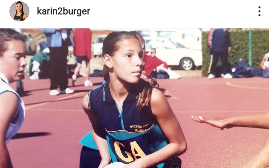 A young Karin Burger playing netball in South Africa.