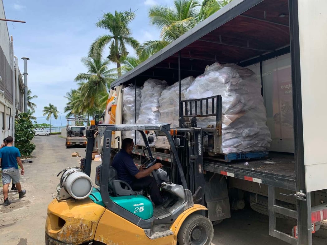 In Suva, emergency supplies bound for the Lau Group in Fiji are prepped and loaded for transport. 2022
