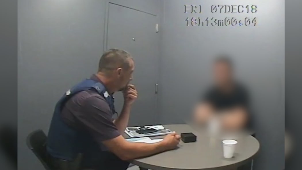 Millane trial: blurred screengrab of police interview with accused.