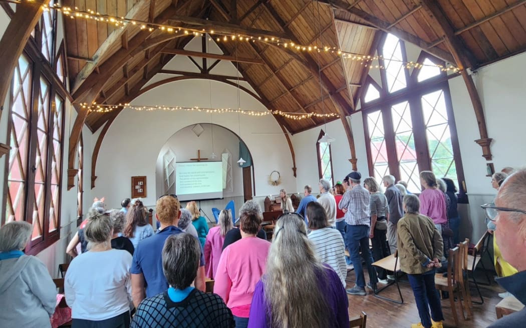 A Christmas Carols event held at the Kakanui Church in 2024. 
An Otago couple have spent six years restoring a timber Presbyterian church in Kakanui, designed by architect Robert Arthur Lawson, which has now been recognised as a Category 1 historic place.
