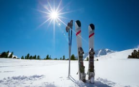 Skiing, winter season , mountains and ski equipment on ski run