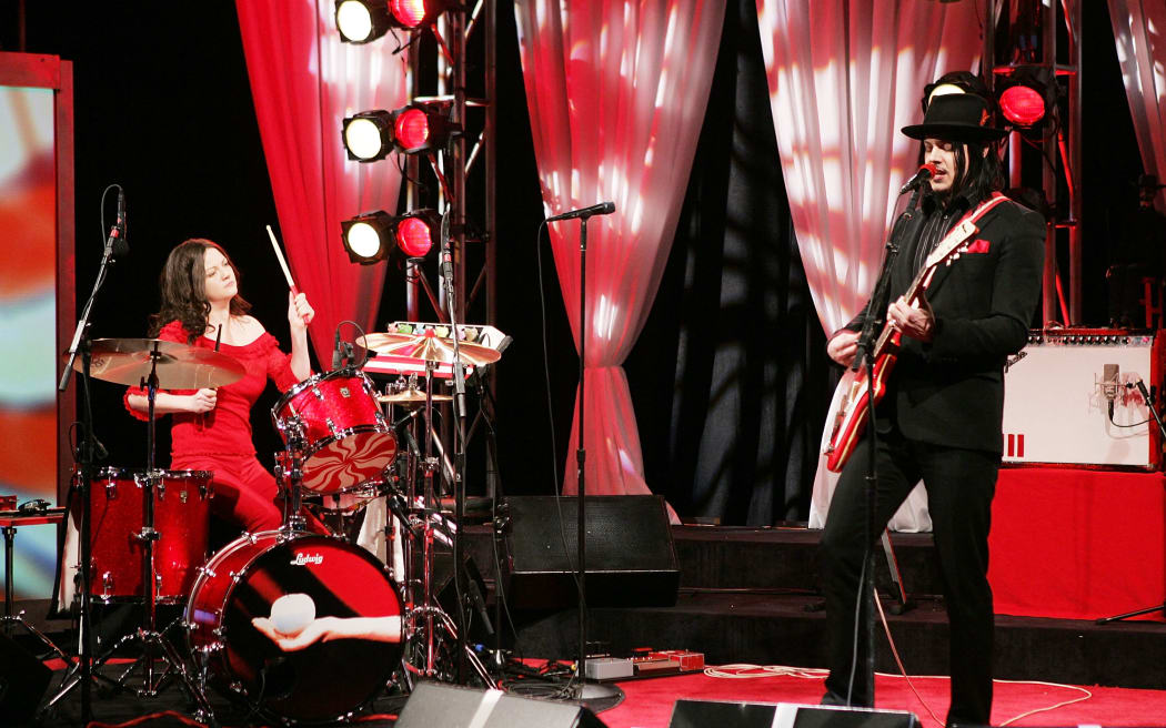 Jack White and Meg White of the White Stripes perform on The Daily Show With Jon Stewart, 2005.