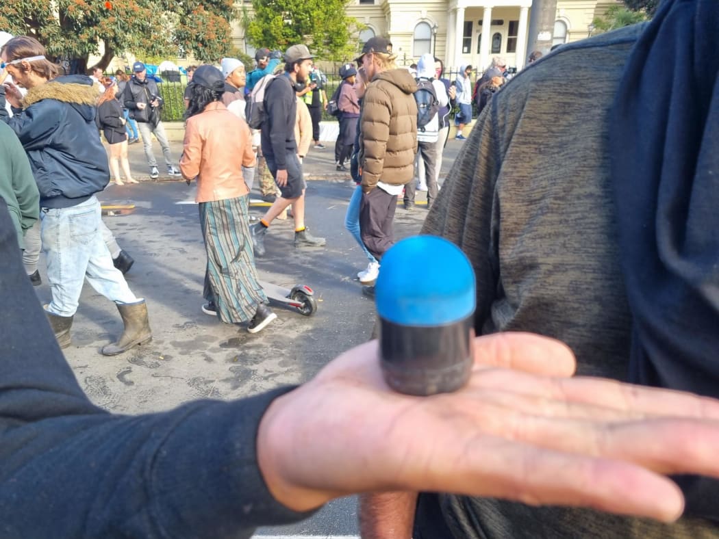 One man said he was hit by a sponge bullet when he had trying been trying to stop other protesters from throwing bricks at police.