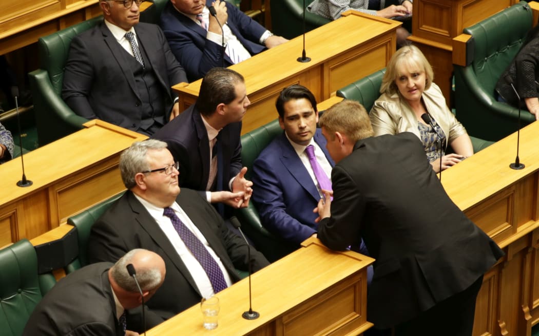 Jami-Lee Ross at Simon Bridges' side during a session in Parliament.