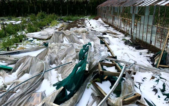 Debris was flung over a glasshouse in Motueka and the neighbour's property as a twister moved through the area, after which hail hit as well.