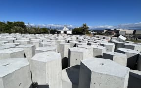Interlocking concrete components ordered by the Westland District Council for their beach access project sit on the Hokitika foreshore but the project has not progressed after the West Coast Regional Council declined to pay.