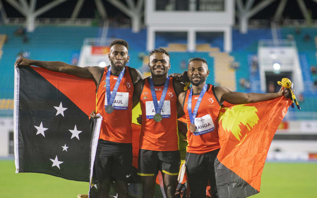 Papua New Guinea’s trio of Benjamin Aliel (middle), Daniel Baul (left)and Emmanuel Wanga won all the medals available in the men’s 400 metre final at the Sol2023 Pacific Games on Wednesday night. 29 November 2023