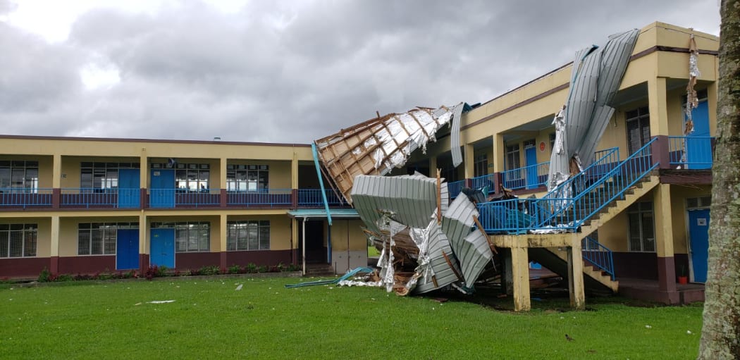 A roof is ripped off by Cyclone Harold
