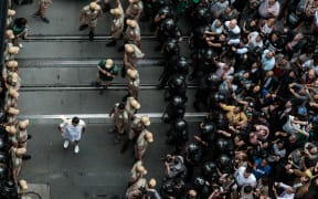 The torch ceremony would be met with protest in neighboring towns, where police clashed with demonstrators ahead of the torch's arrival.